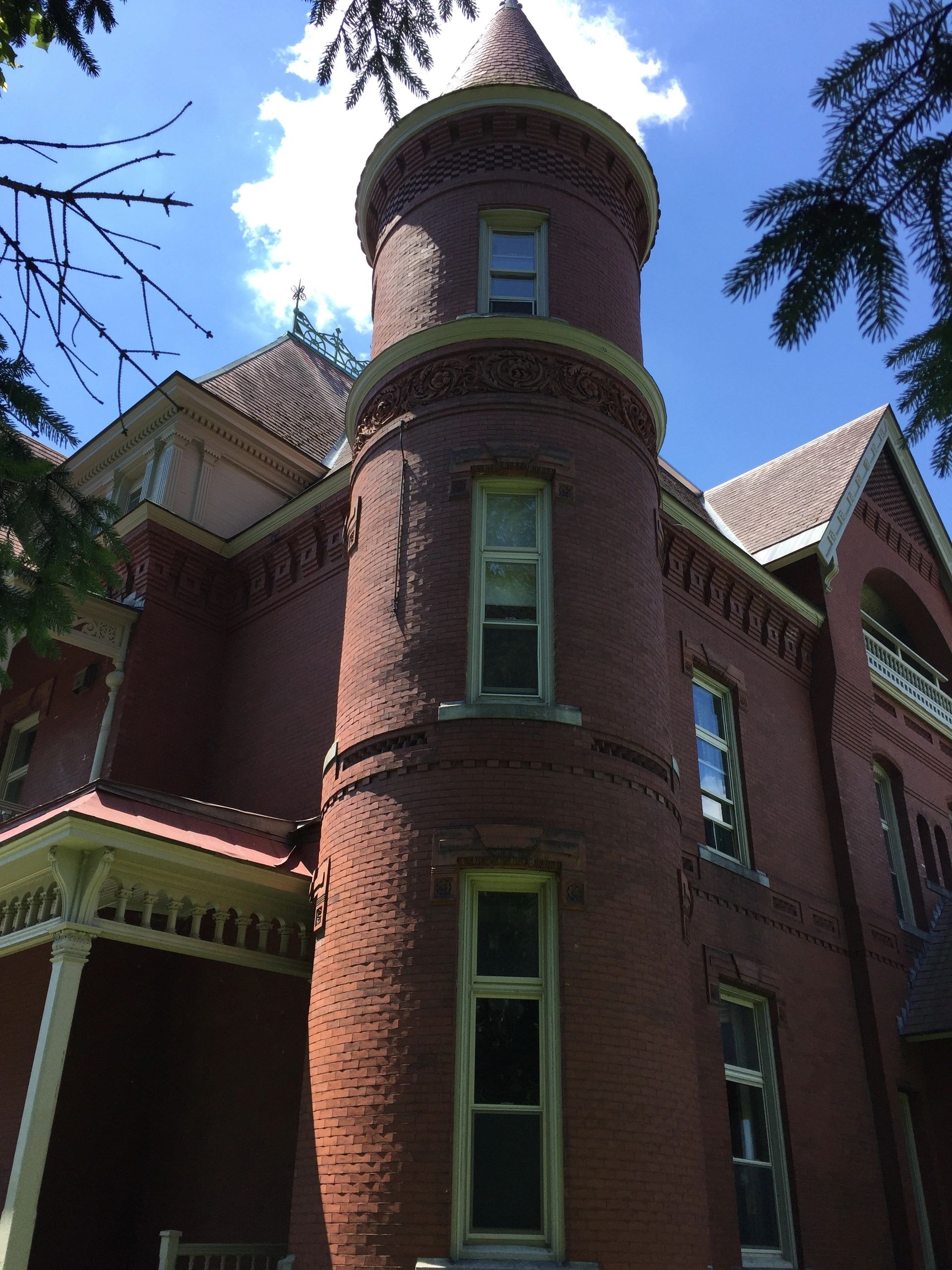Victorian era brick mansion with turret